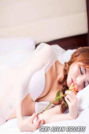 Una, Korean escort profile photo in London